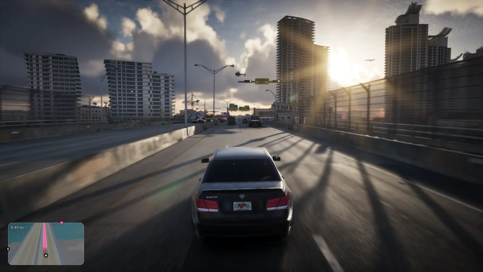 A dark grey Benefactor Schafter V12 drives along a raised road in Vice City towards high-rise towers and a low sun, with a map in the corner.