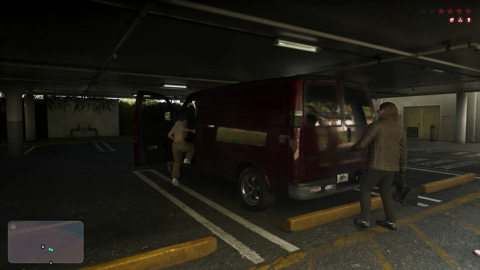 A woman climbs into a dark red van while a man in a brown jacket stands by its rear in a dim covered car park.