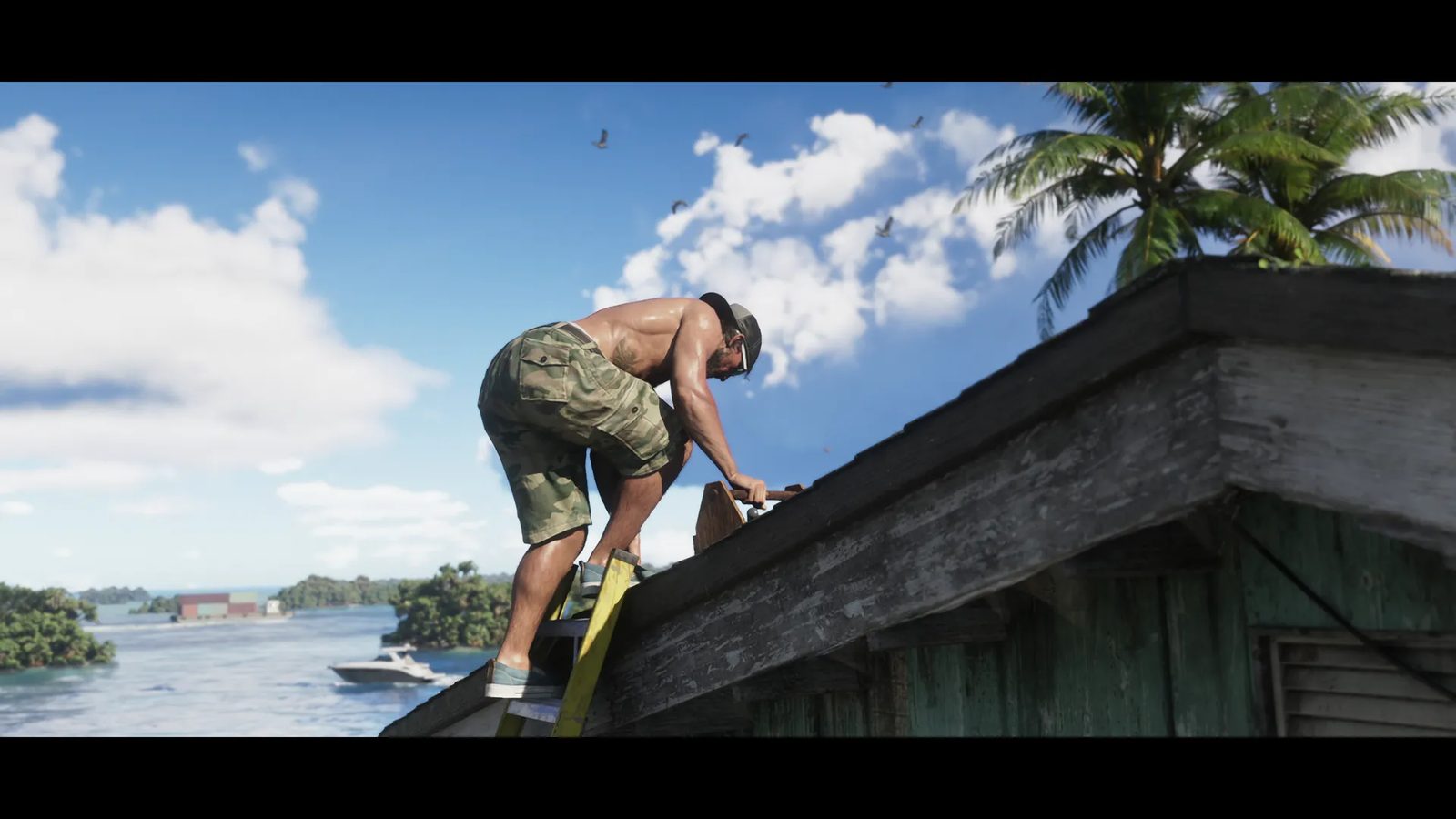 Jason Duval, shirtless in camouflage shorts and a cap, hammers on a weathered roof from a yellow ladder, with islands and a boat behind him.