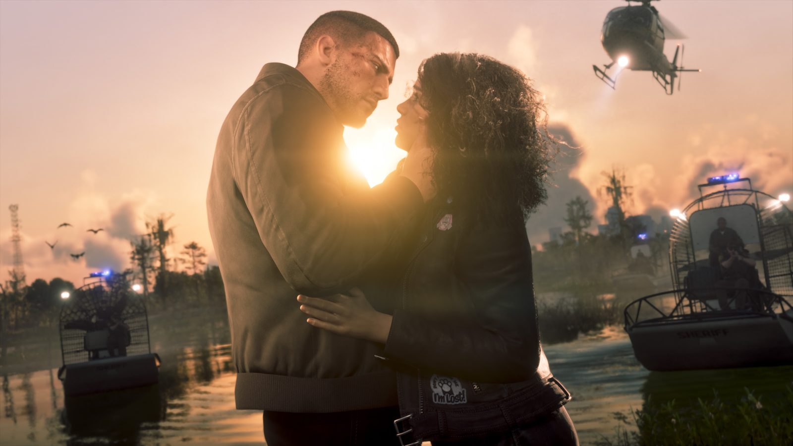 Jason Duval and Lucia Caminos embrace at sunset in the Grassrivers, with Sheriff airboats and a police helicopter closing in behind them.