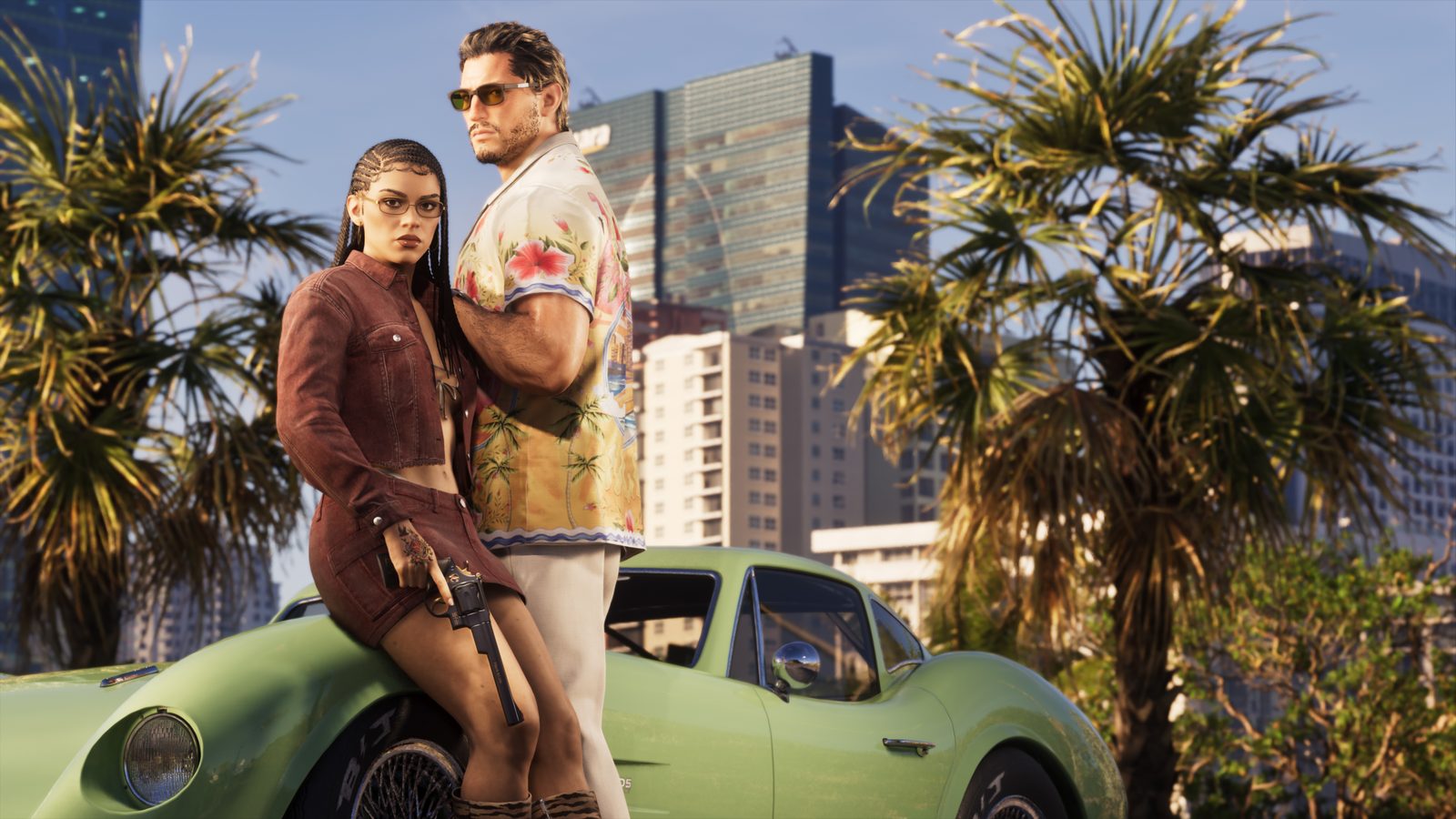 Lucia Caminos holds a revolver beside Jason Duval, who wears a floral shirt, in front of a green classic sports car with palm trees and tower blocks behind.
