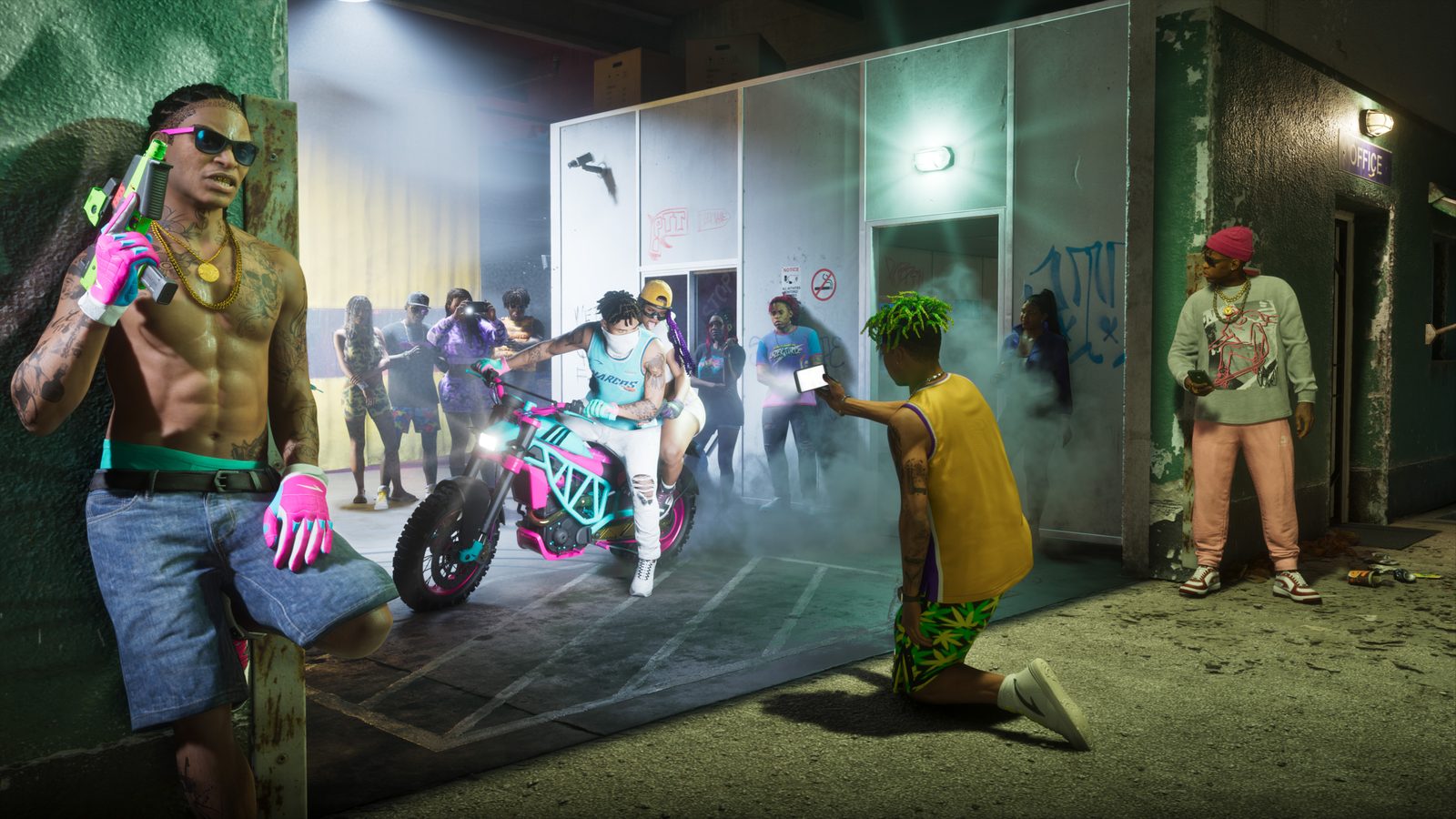 A shirtless tattooed man with a neon pistol leans on a wall as two riders on a pink and turquoise motorbike are filmed by a crowd in a smoky alley.