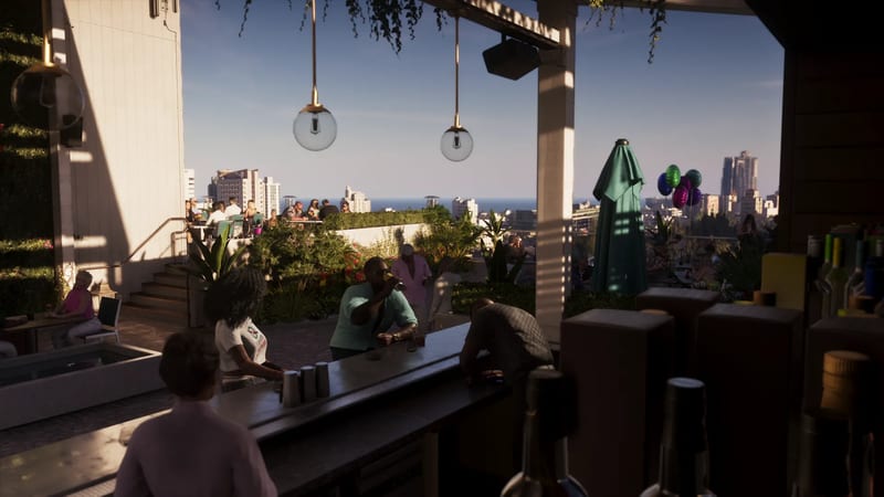 Customers drink at a rooftop bar counter, with a green parasol and a city skyline beyond, in warm late-afternoon sunlight.
