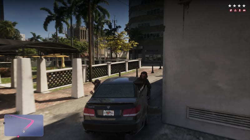 Two men get out of a dark saloon car on a paved path beside a palm-lined park in Vice City, with a four-star wanted level and a minimap on screen.