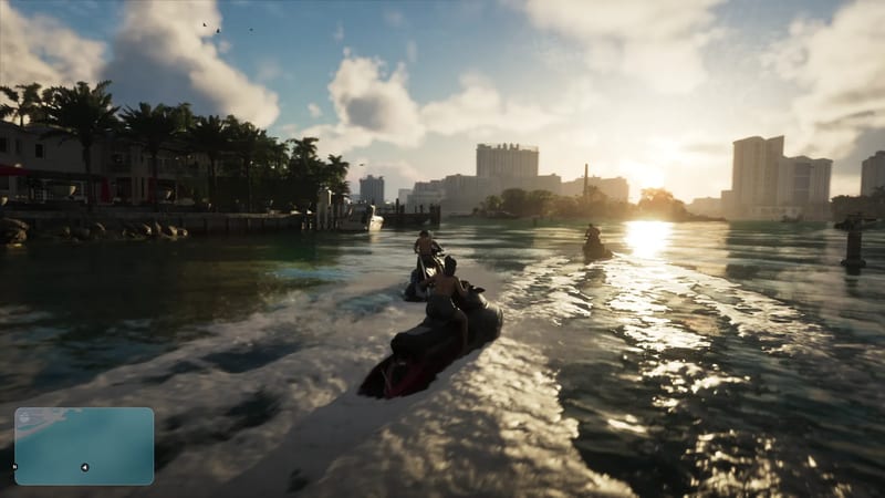 Three people ride jet skis across a calm waterway towards a low sun, with waterfront houses, palm trees and tall buildings ahead.