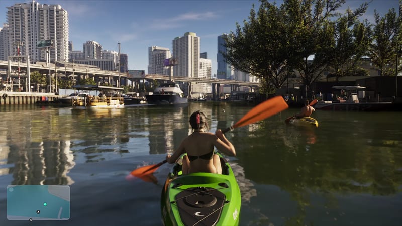 A woman in a black bikini paddles a green Crest Kayak along a city waterway, with high-rise towers and a flyover ahead in bright daylight.