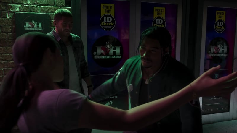 A woman with a ponytail reaches out towards a doorman in a green jacket outside Jack of Hearts, as a man in a checked shirt looks on at night.