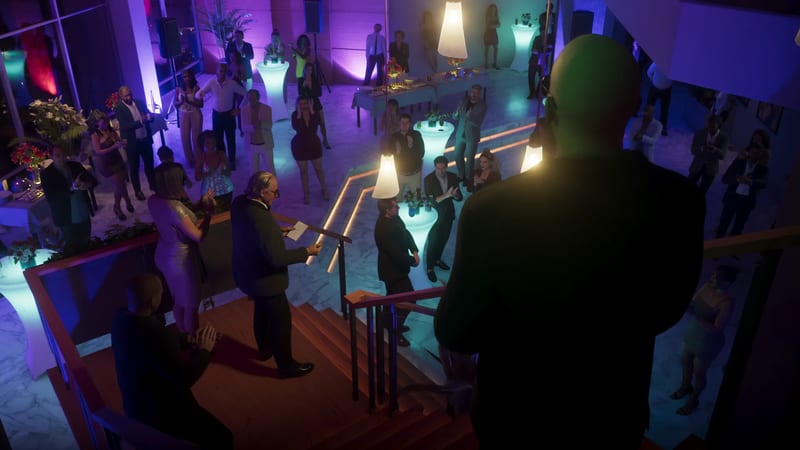 A bald man in dark clothing watches from a staircase as an older man reads from a paper to a clapping crowd at a neon-lit party.