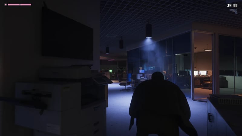 A dark silhouetted figure walks through a dim open-plan office lit by blue light, past a large photocopier and glass-walled meeting rooms.
