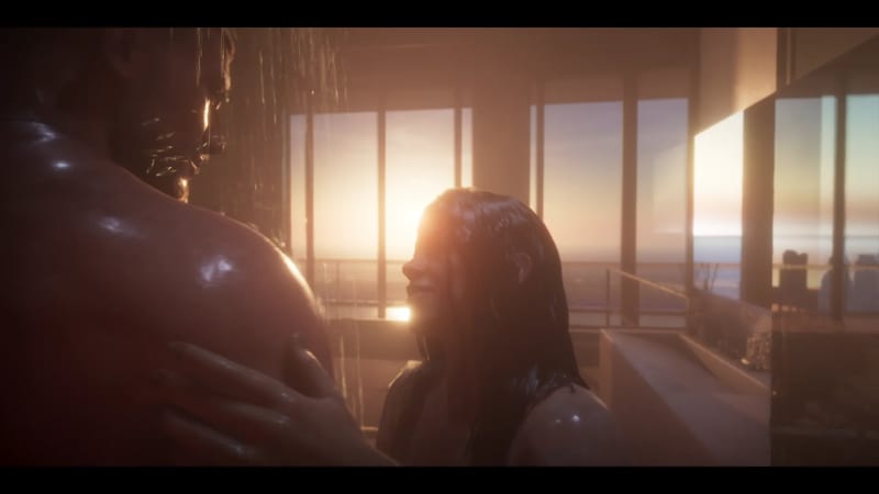 A man seen from behind and a woman with wet dark hair stand close together in a shower, with a bright sunset glowing through tall windows behind them.