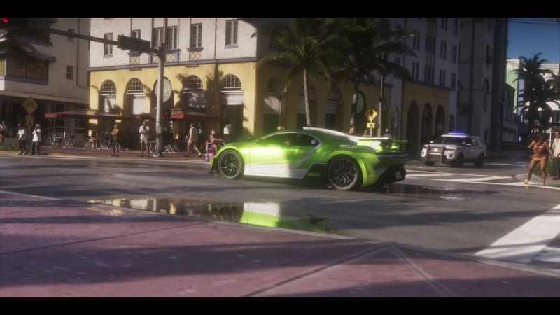 A lime green and white sports car turns at a sunny street junction in Ocean Beach, with a police SUV, palm trees and pedestrians nearby.