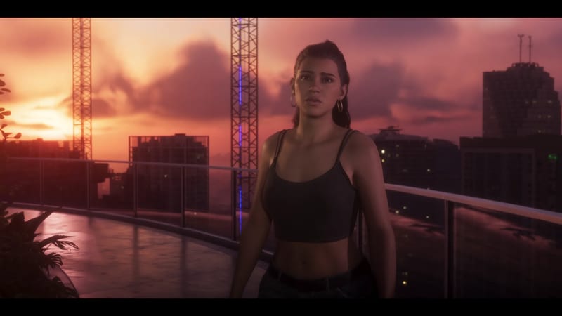 Lucia Caminos stands on a curved rooftop terrace with a glass railing, looking worried, as the sun sets behind city towers and cranes.
