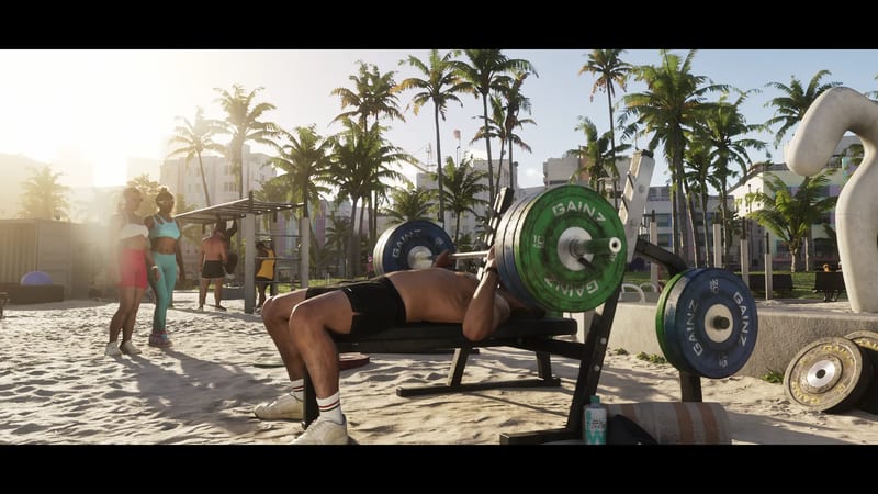 A shirtless man bench presses a green and blue GAINZ barbell on a sunny beach outdoor gym in Vice City, with palm trees behind.