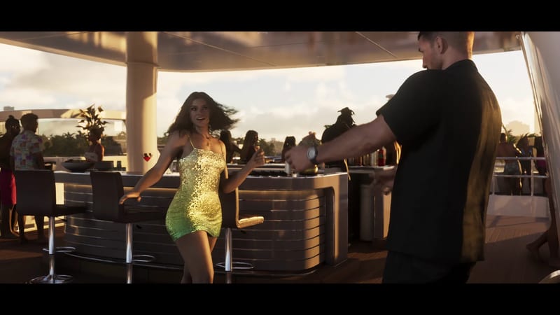 A woman in a short gold sequin dress dances towards a man in a black shirt beside a bar on the deck of a yacht at golden hour.