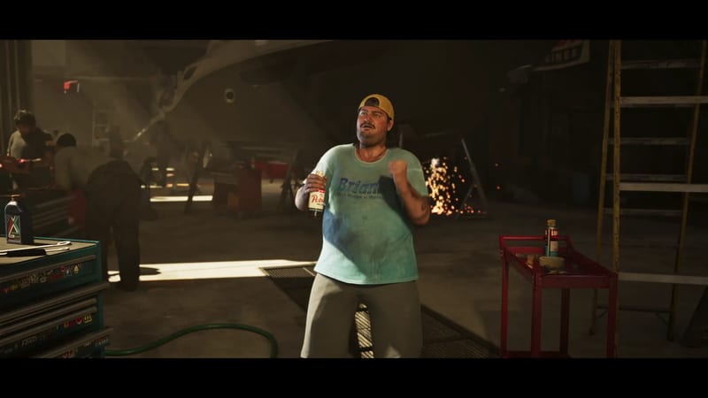 A bearded man in a backwards yellow cap and teal T-shirt holds a bottle and clenches a fist in a boat workshop, with sparks flying behind him.