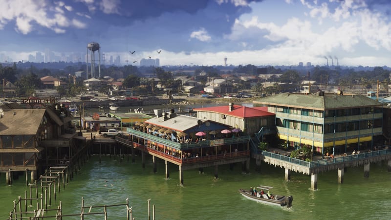 Waterside restaurants on wooden stilts over green water, with a small boat passing and a water tower and town behind, in Grassrivers.