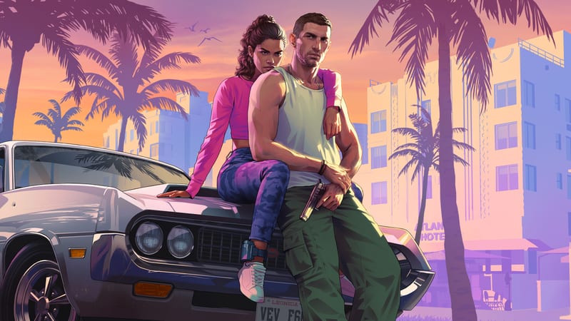Lucia Caminos sits on the bonnet of a silver car with Jason Duval leaning beside her, palm trees and a pastel hotel behind at sunset.
