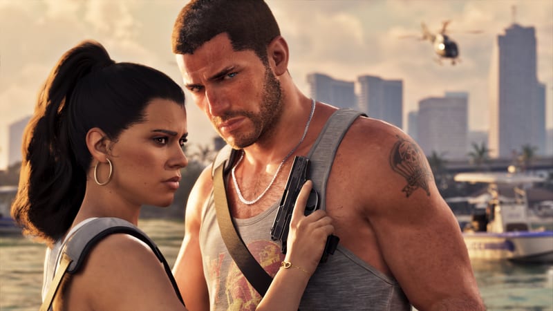 Jason Duval and Lucia Caminos stand close together by the water, her hand on a pistol held against his chest, with a city skyline behind them.