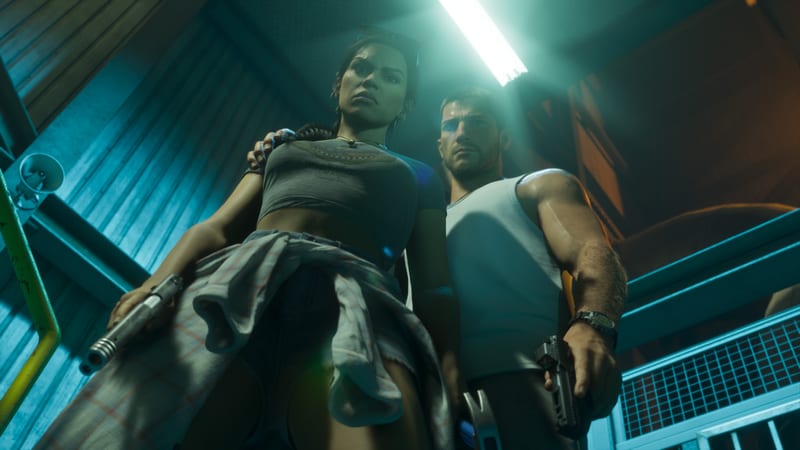 Lucia Caminos and Jason Duval stand side by side holding pistols, seen from below under a bright strip light in a teal-lit industrial stairwell.