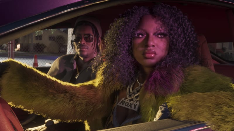 Roxy character from GTA 6 sitting in a car wearing in a green fur coat, with a man in sunglasses and a beanie behind her.