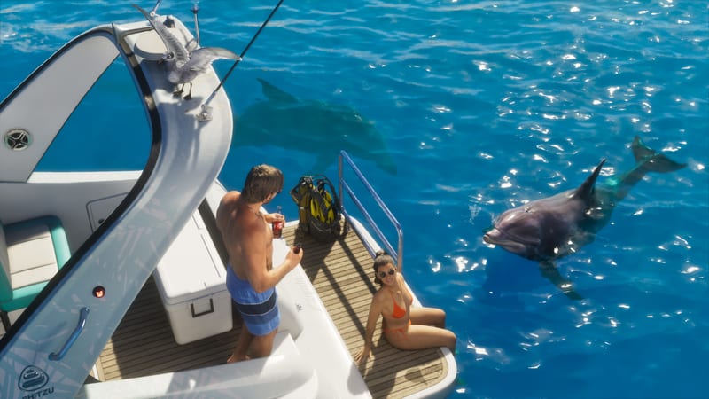 A man and a woman relax on the stern of a white Shitzu Squalo boat as a Dolphin surfaces beside them in bright blue water, with a seagull perched above.